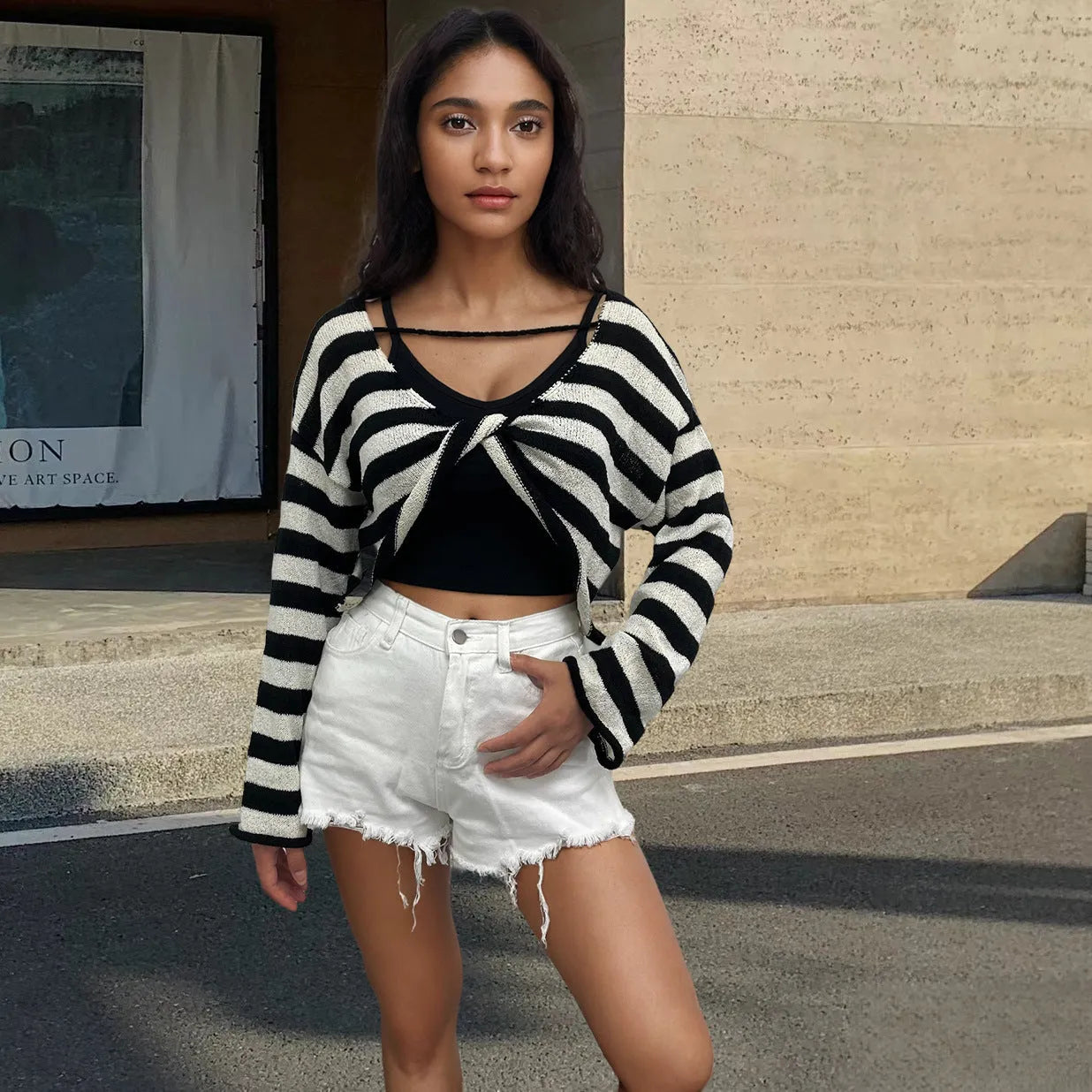 Striped long-sleeved cotton sweater shown wearable front and back, in black, pink, khaki, blue, or navy blue.