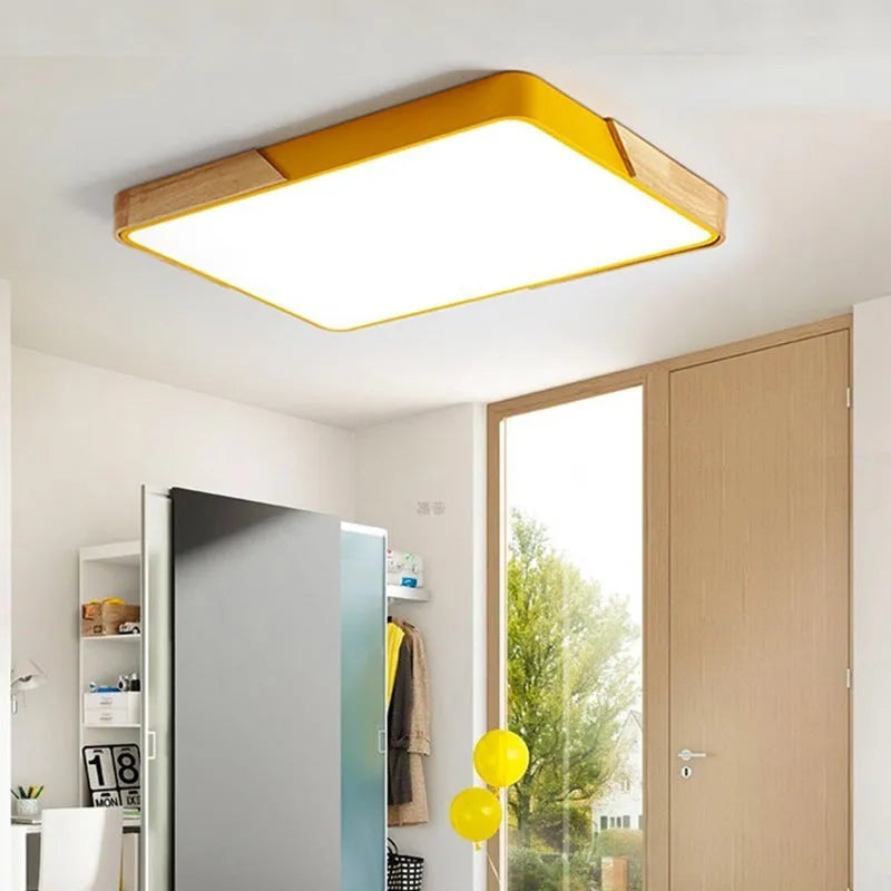 Round macaron LED ceiling light in white with plastic shade for bedroom use