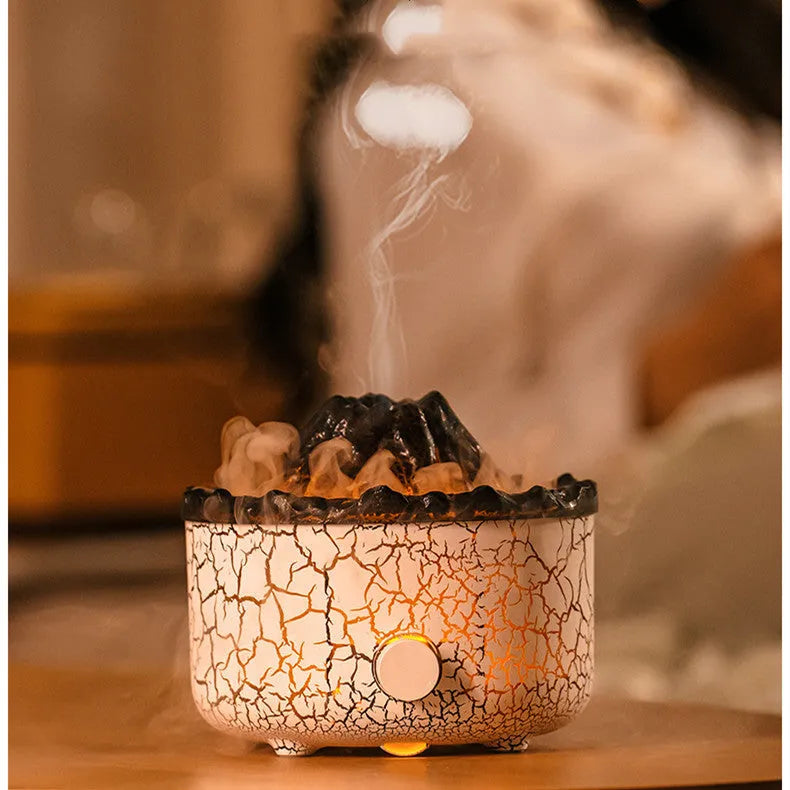 Volcano-shaped humidifier diffuser with LED flame lighting effect emitting mist puffs
