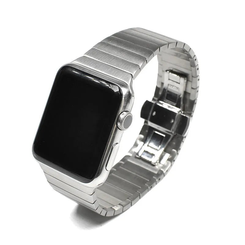 Stainless steel metal bracelet strap with butterfly clasp for Apple Watch in silver colour.
