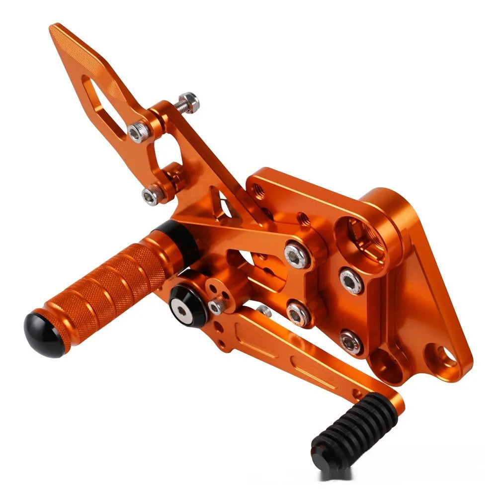 KTM DUKE rear shift pedal support assembly kit in black and orange colours