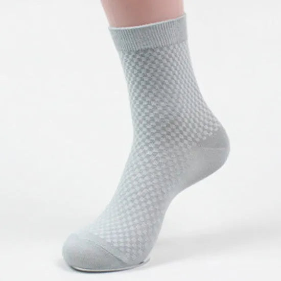 Men's bamboo fibre business socks in a small square pattern, shown in navy blue colour.