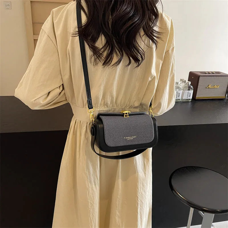 Women's PU leather messenger bag in horizontal square design with contrast stitching
