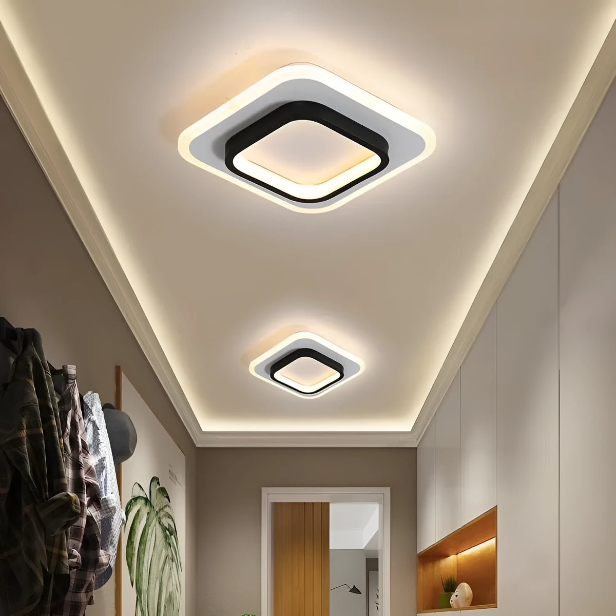 Black finish LED corridor light with acrylic diffuser on indoor wall