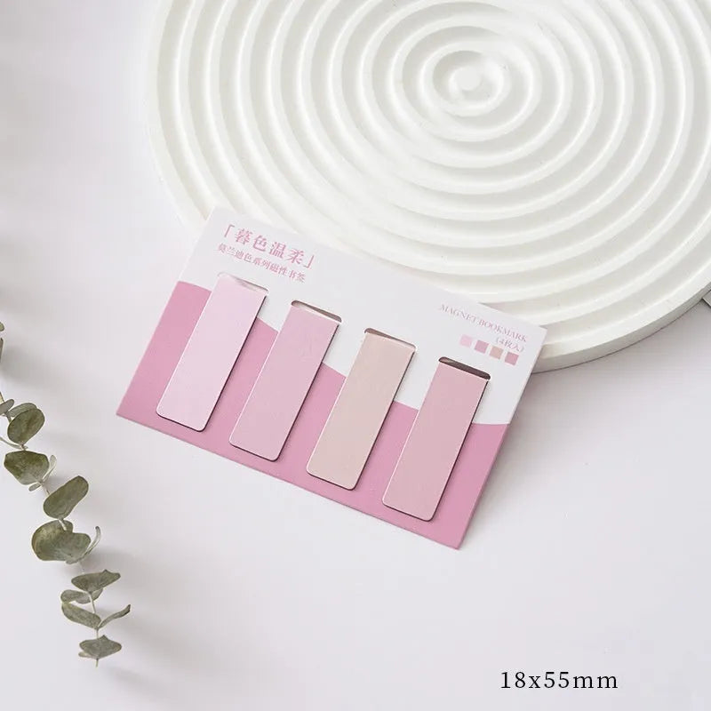Set of four small magnetic bookmarks showing Morandi colour blocks in soft green, grey, pink, and blue tones.