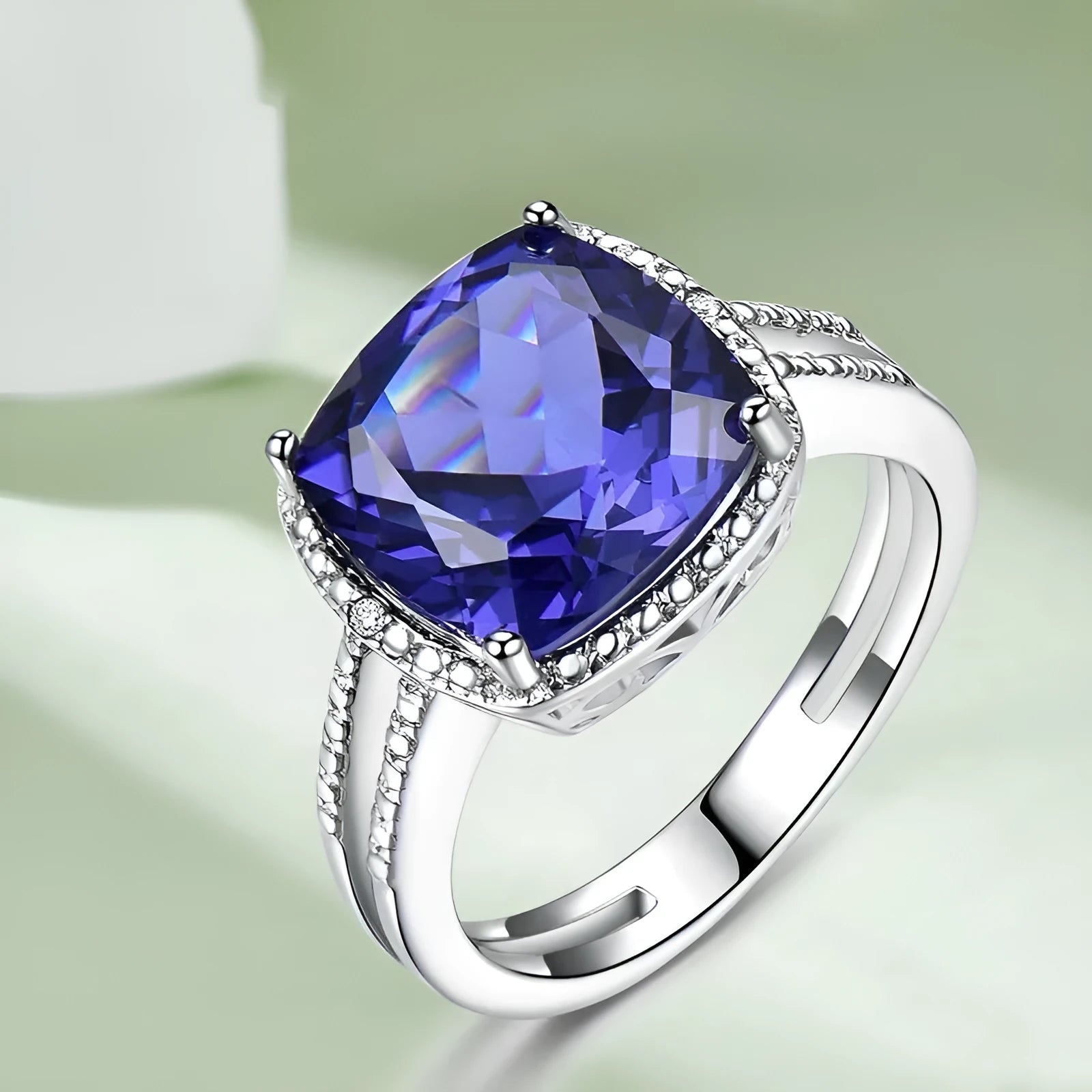 Women's sterling silver ring with a deep blue tanzanite gemstone.
