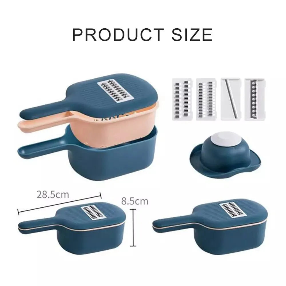 Dark blue scoop vegetable cutter with four stainless steel blades, hand guard and drain basket on a kitchen worktop
