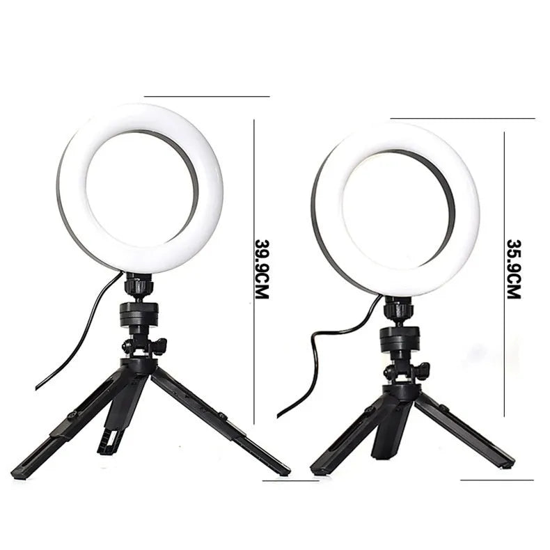 Black smartphone desktop tripod suit with adjustable colour fill light and universal clip mount.