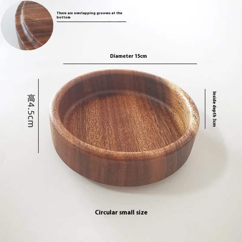 Walnut wooden fruit plate tray in rectangular size on a table surface.