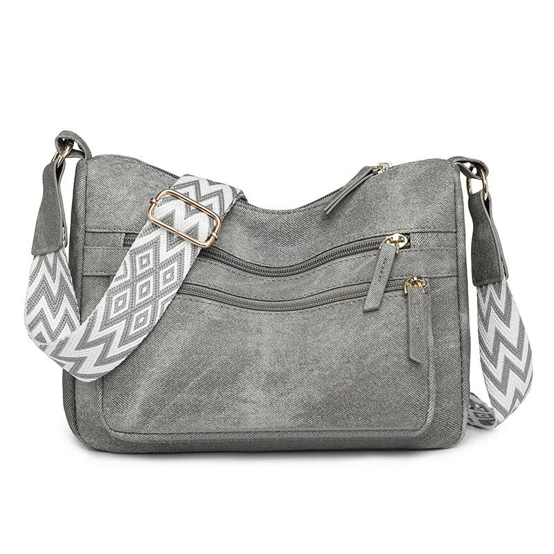 Women's large capacity one shoulder crossbody backpack in soft PU leather with waterproof finish, available in five colours
