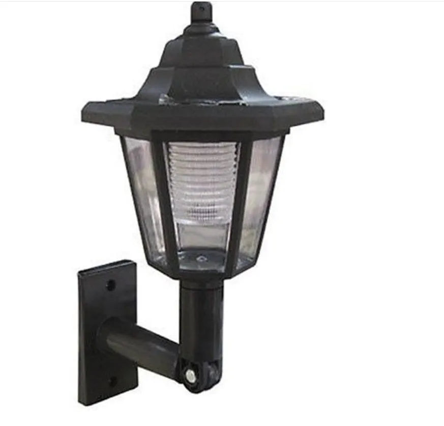 Black hexagonal solar wall light with IP44 waterproof rating for outdoor garden and pathway illumination