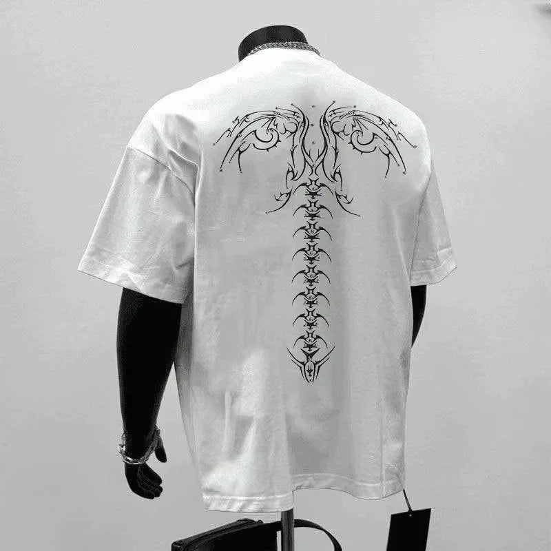 Man wearing a loose-fitting black pure cotton short sleeve top suitable for business casual wear.