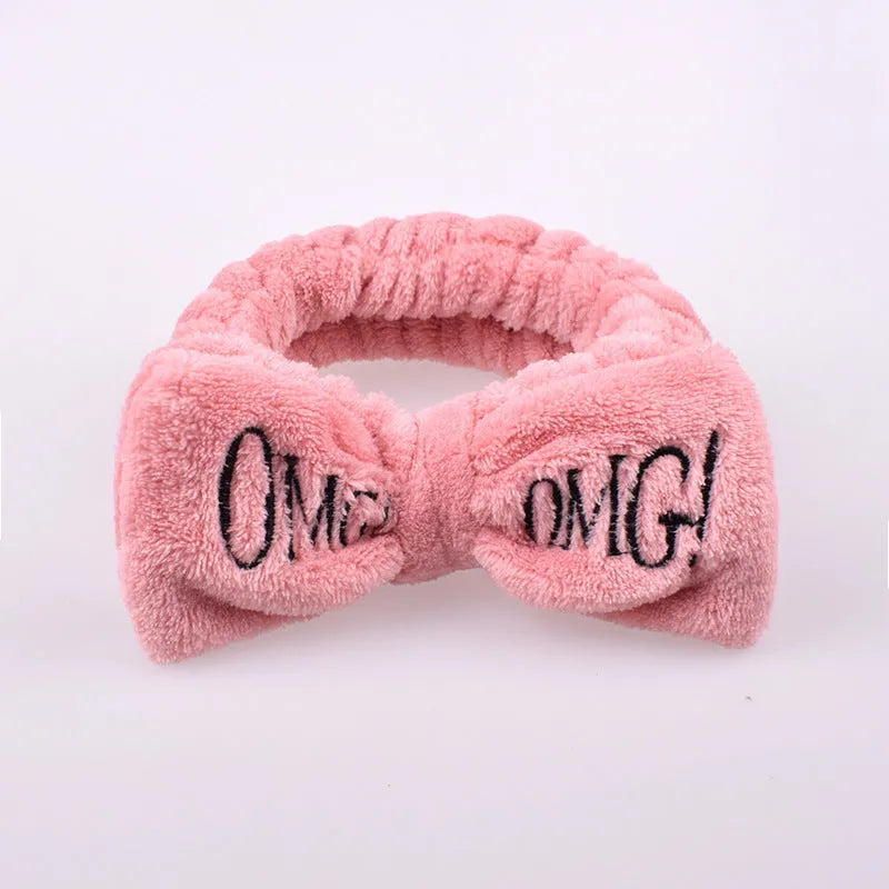 Coral velvet butterfly end hair band in pink with letter text styling