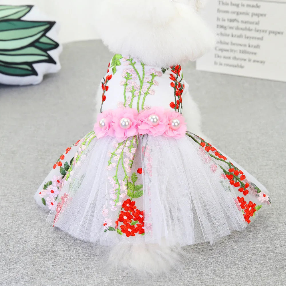 Cotton dog wedding dress in multi-leaf pink princess style on a small dog