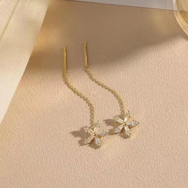 Long style gold dangle earrings for women with metal construction