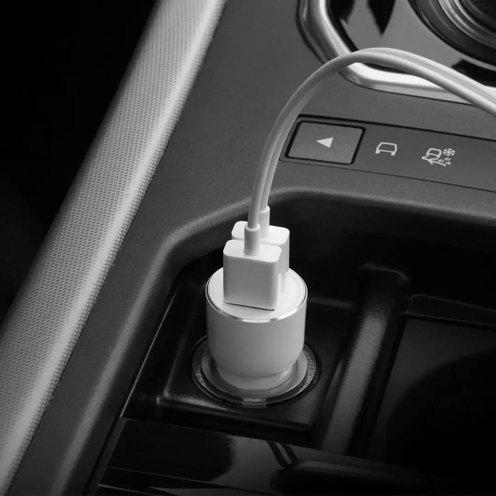 Black Ruimi 3S Music Bluetooth Car Charger with USB port for vehicle use.