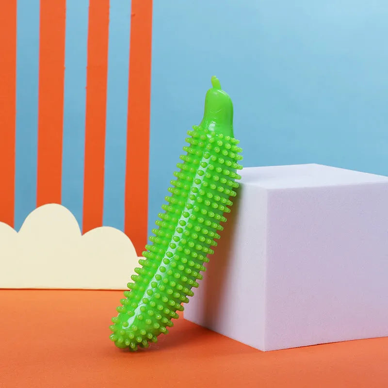 Green silicone dog chew toy shaped like a cucumber, 24cm long, for large breed teething and training.