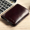 Men's black full-grain leather bifold wallet open, showing card slots, note pocket, and zipped coin compartment.