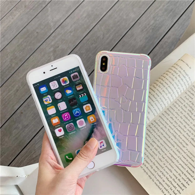 Silver laser finish silicone iPhone case showing glossy texture and protective design