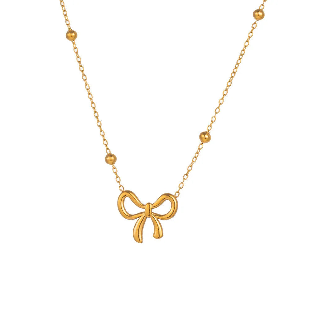 Gold electroplated bow necklace on titanium steel chain with adjustable 41-50cm length