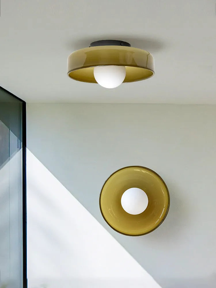 White round glass ceiling light fixture with a 25cm diameter shade.