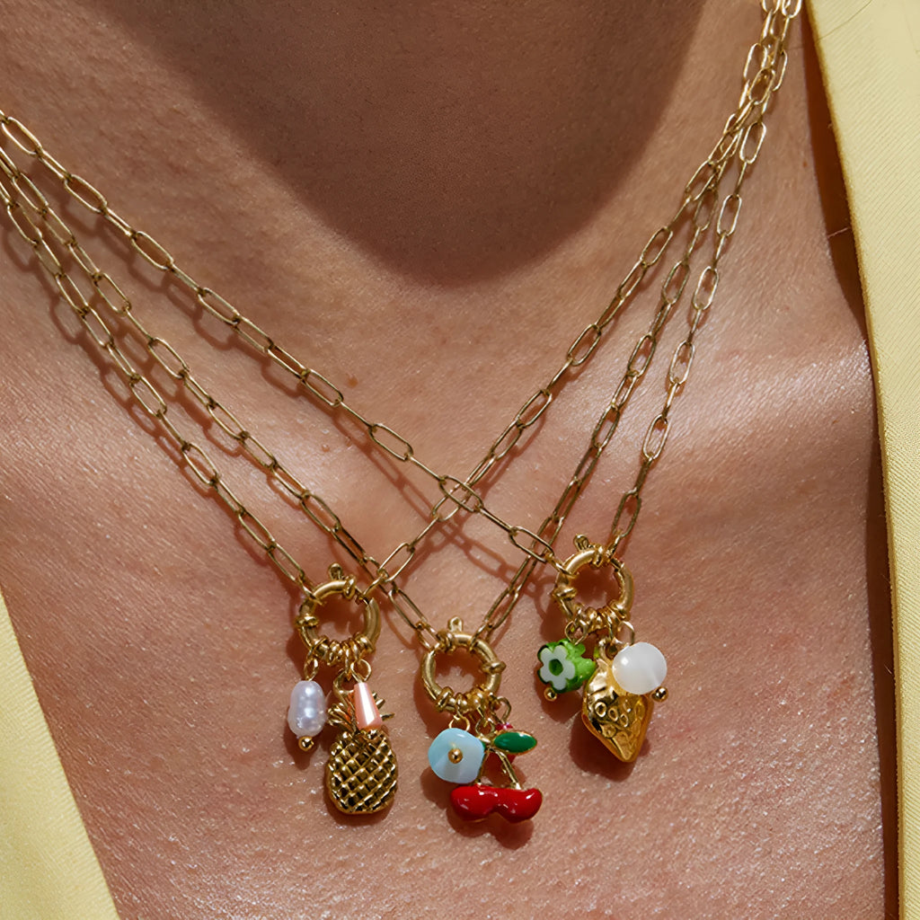 Stainless steel clavicle chain with geometric strawberry-shaped titanium steel pendant in non-fading finish