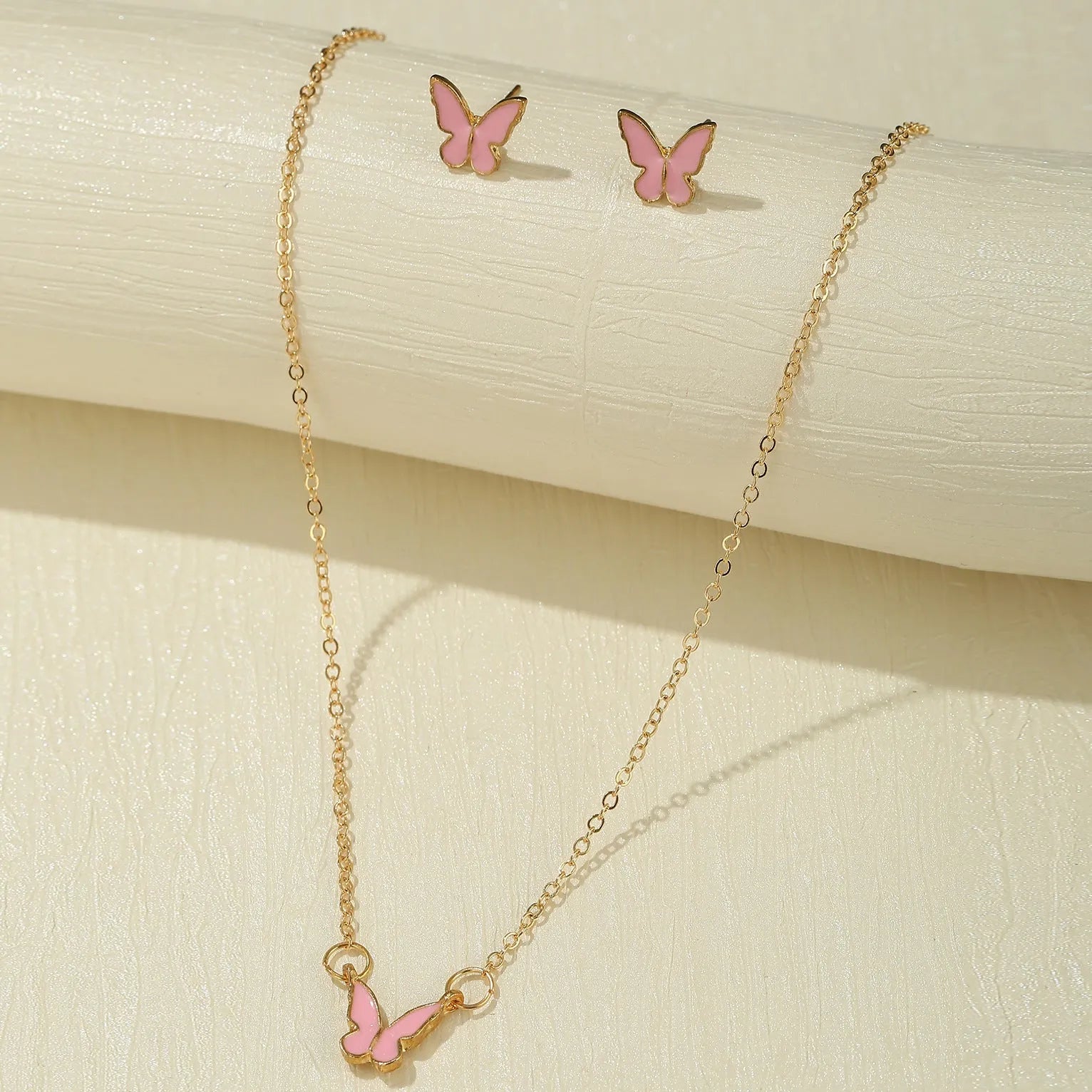 Butterfly jewelry set with alloy pendant and electroplated finish in a geometric retro simplicity design