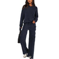Women's long sleeve polyester leisure suit set in a choice of colours, showing top and trousers for casual sports.