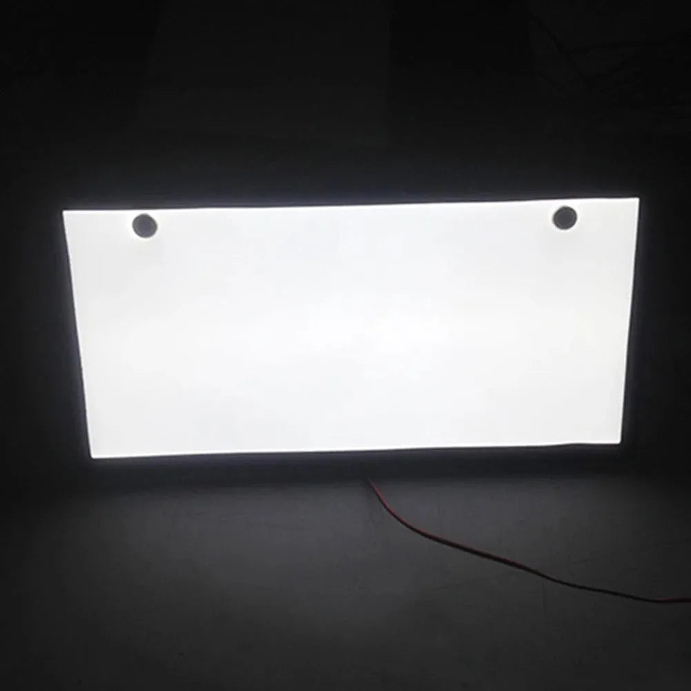 Two LED license plate lights for trucks with plastic housing and uniform illumination
