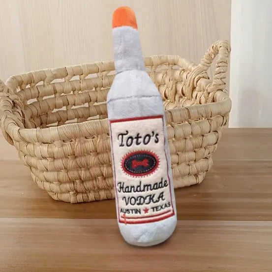Brown wine bottle shaped plush dog chew toy for dental care and interactive play