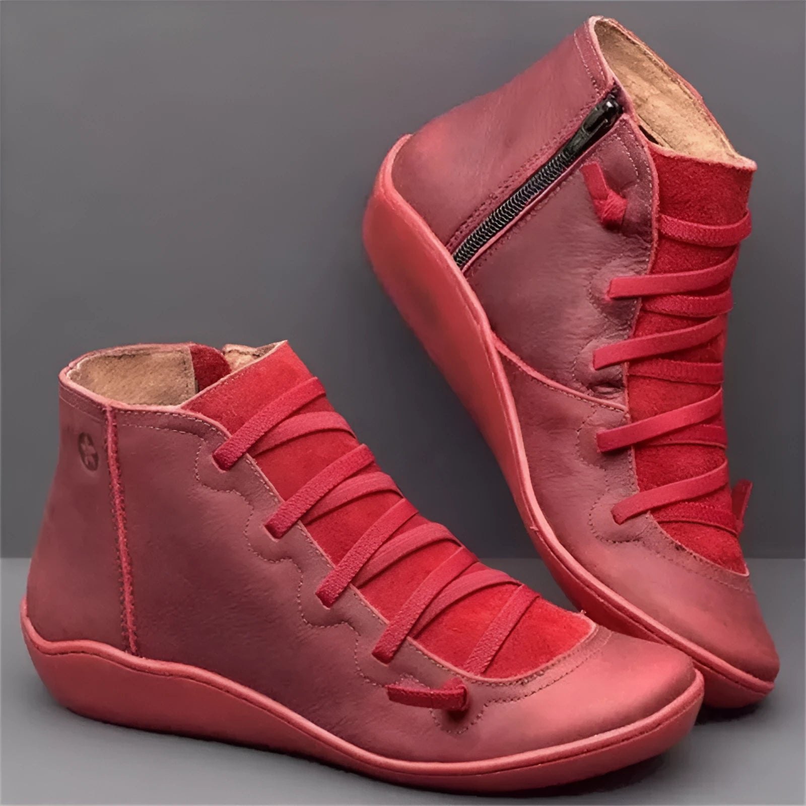 Women's casual flat boots with a wedge heel and round toe in various colours.