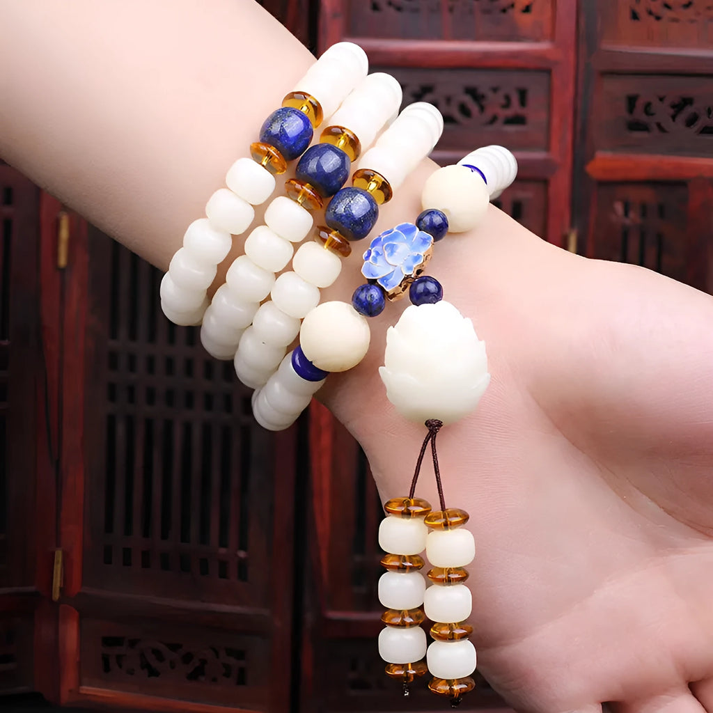 White jade Bodhi bead bracelet with 6x8mm beads, shown in a unisex long bracelet or necklace style.
