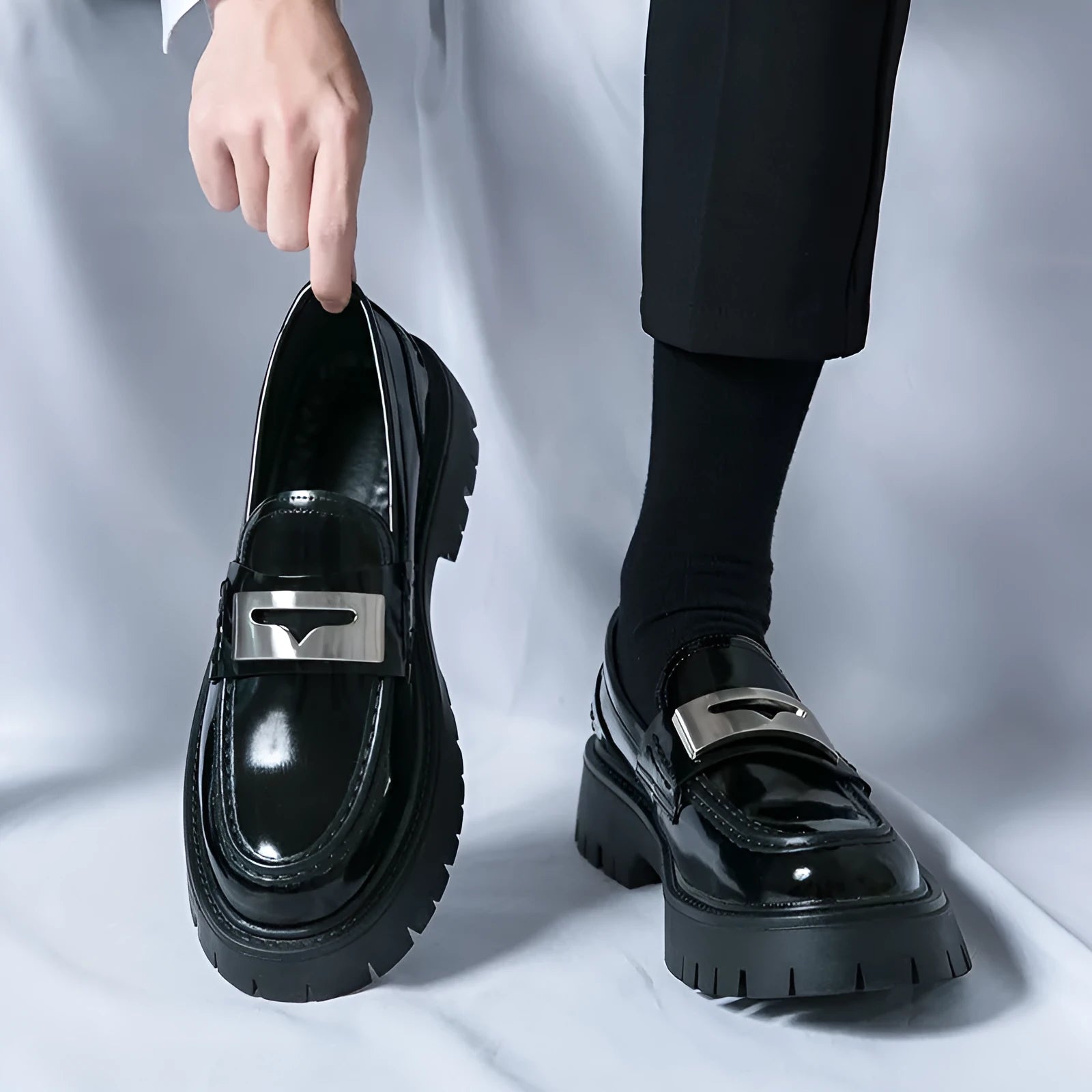 Men's glossy black platform loafers with hidden low heel