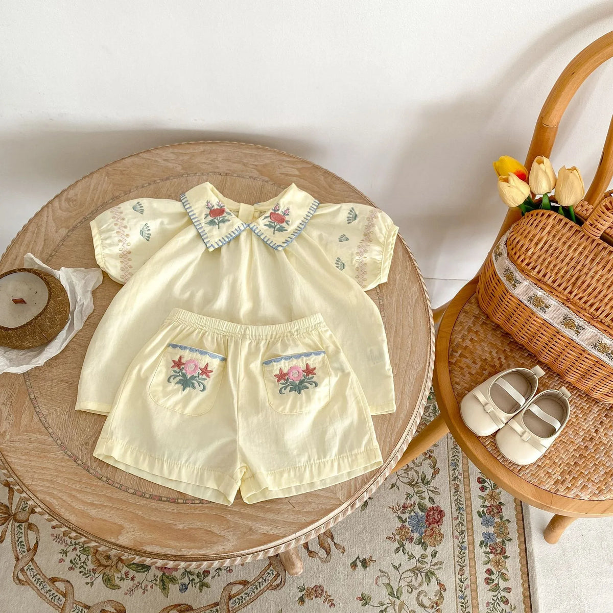 Baby girl yellow cotton suit with flower embroidery on the shirt and matching shorts