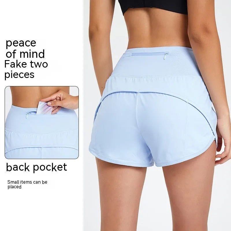 Women's high-waist nylon sports shorts in water blue, shown for summer fitness and running.