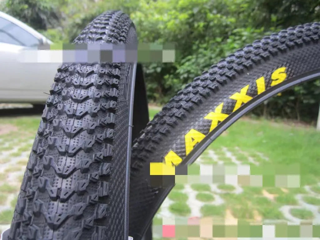Ultralight puncture proof mountain bike tyre shown in multiple sizes for 26, 27.5 and 29 inch wheels.