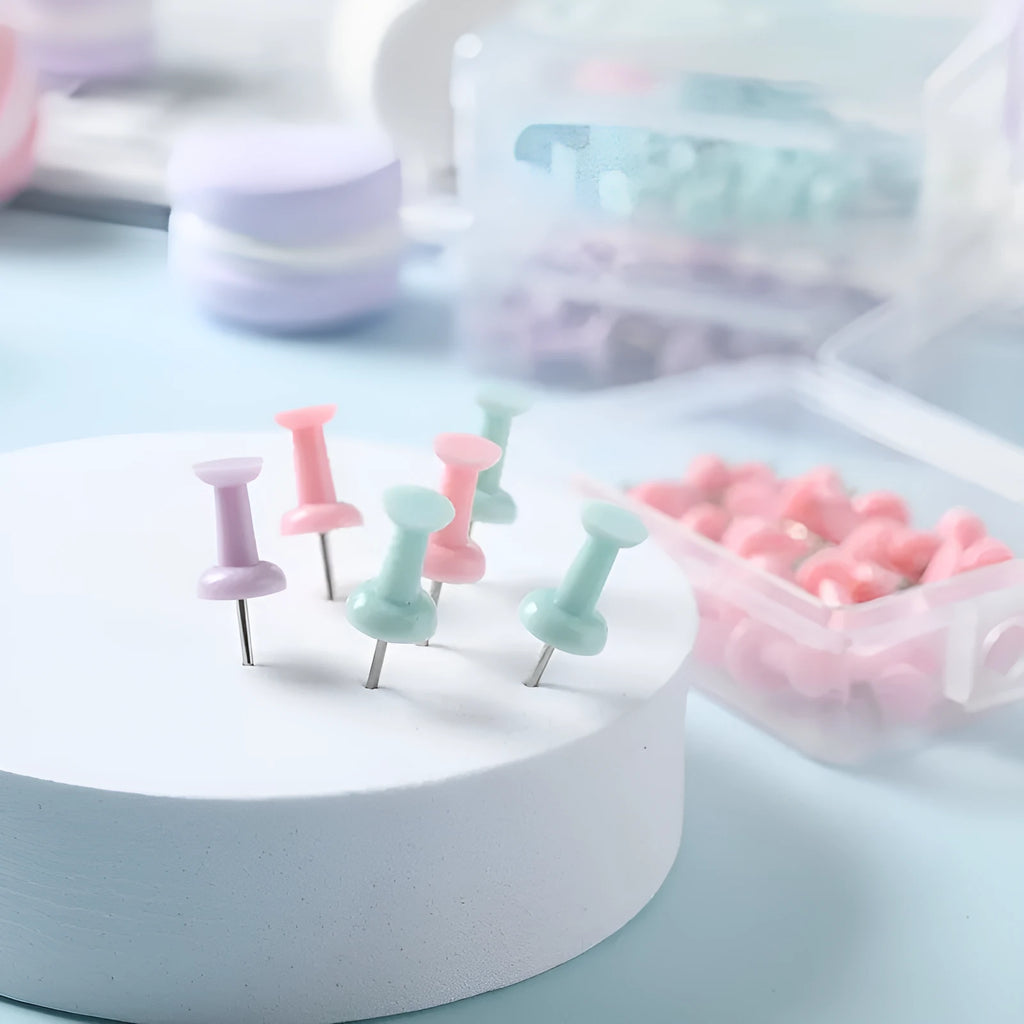 Macaron colour plastic push pins in large and small sizes including cherry blossom pink, mint green and lavender options
