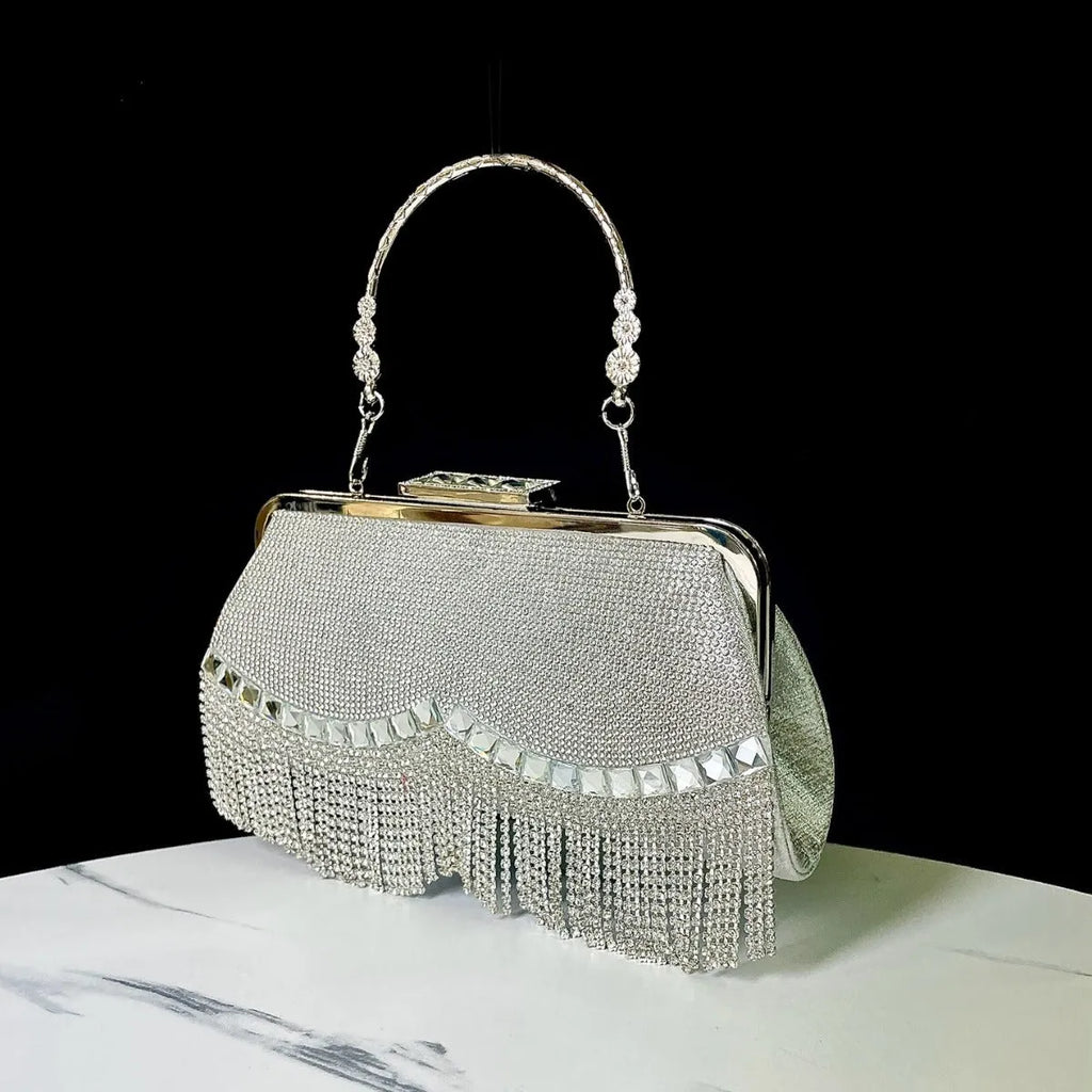 Tassel crossbody banquet bag in polyester shell shape with diamond chain and open pocket, available in black, gold, or silver
