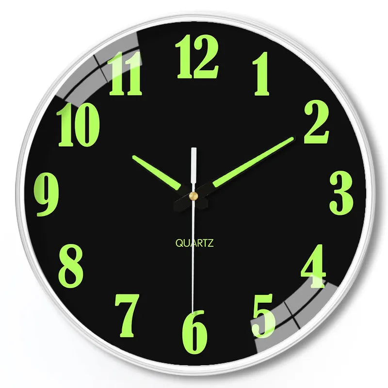 Modern 8-inch luminous wall clock with white face and black numbers on a wall.