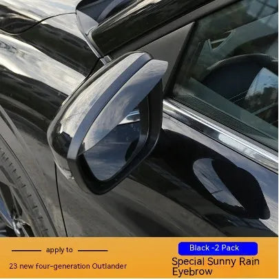 Black engineering plastic window deflectors fitted on a 2023 Mitsubishi Outlander front window.