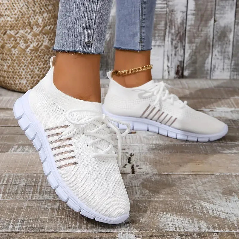 Women's breathable mesh sports flats in multiple colours with front-tie lacing and EVA sole