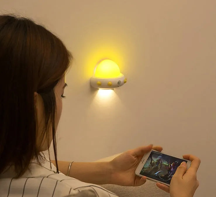 Remote control UFO bedside night light in blue, pink, or white with colourful LED lighting