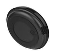 Black compact infrared wifi smart remote control with 360° IR transmission on a table