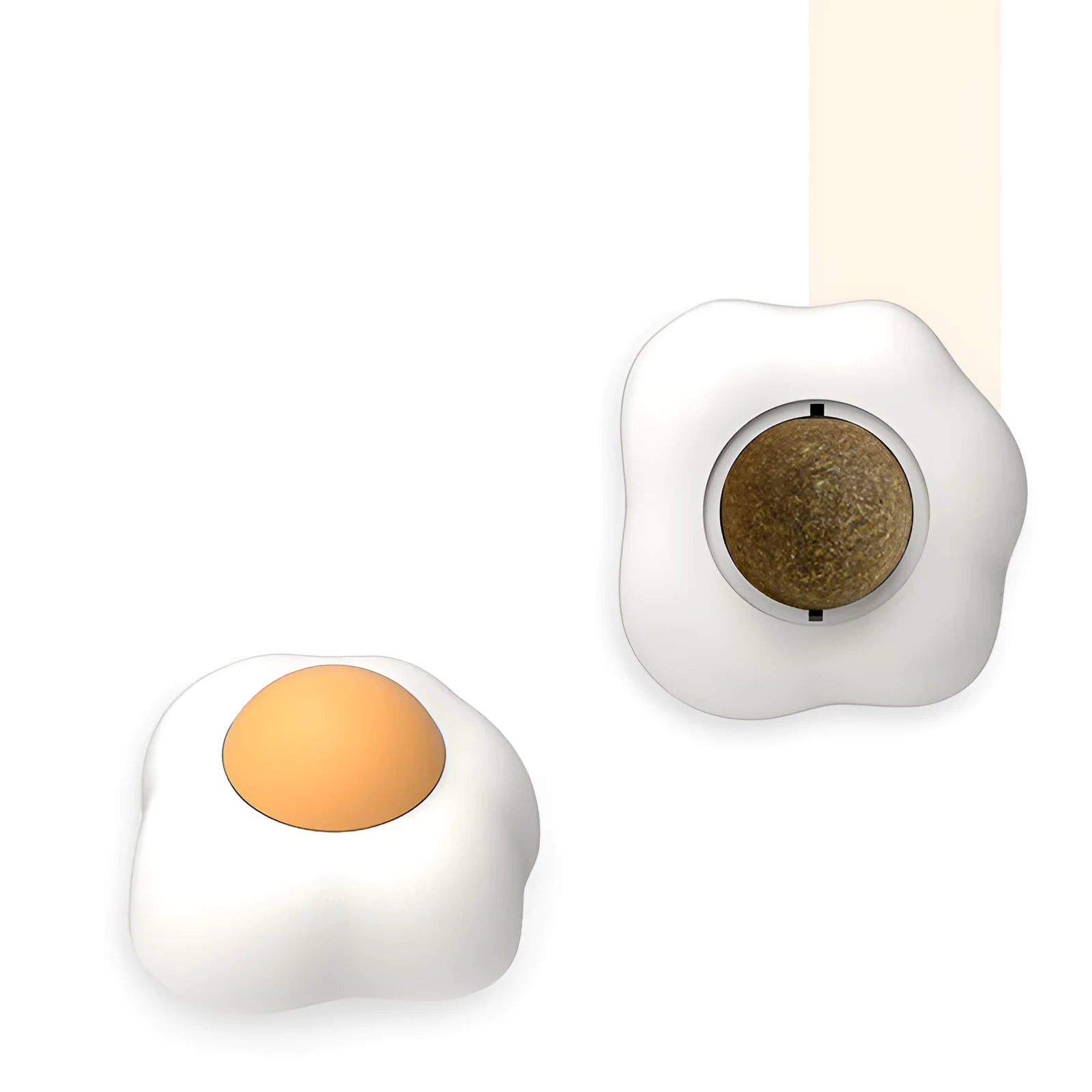 Interactive catnip ball toy with egg design mounted on wall for feline play