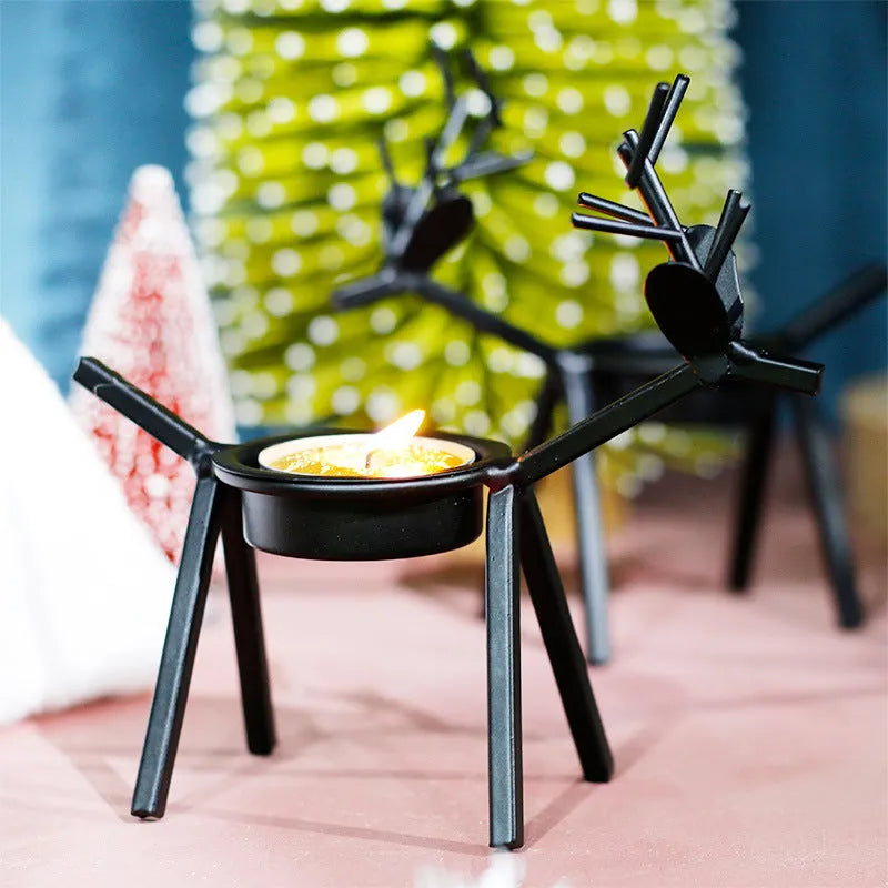 Iron Christmas deer candlestick holder with traditional elk design in black colour