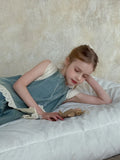 Girls' light blue cotton denim two-piece set with lace trim sleeveless vest and cropped wide-leg pants on child model