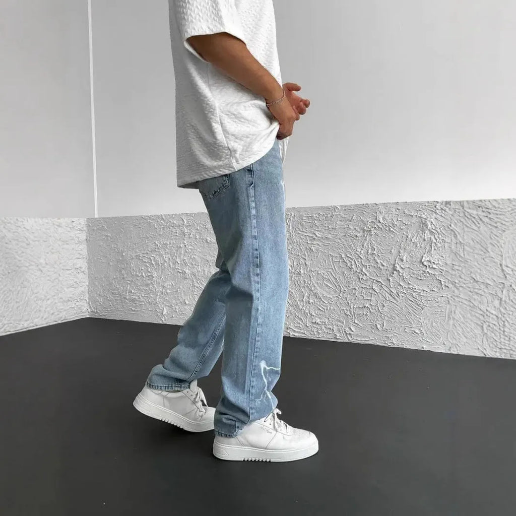 Men's blue straight-leg loose fit cotton denim jeans with mid waist design