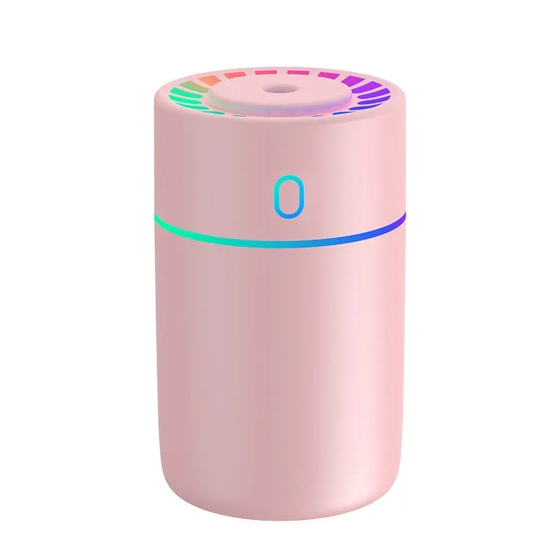 Magic Light USB humidifier in white, pink, or black, round plastic body, heavy fog, for car or desktop use under 10 square metres