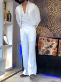 White three-piece women's outfit with V-neck shirt, sleeveless vest, and full-length trousers