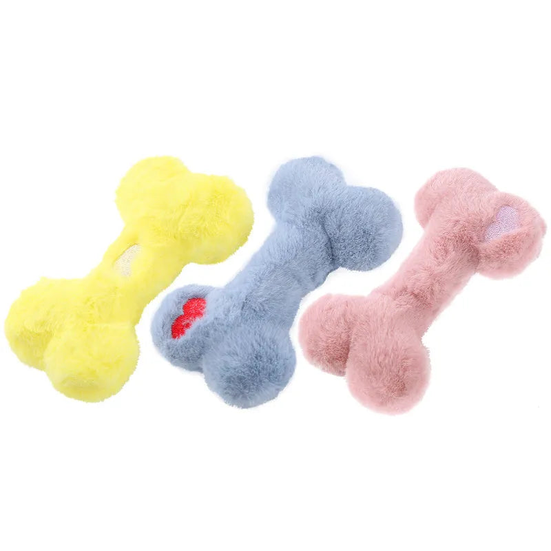Blue love bone shaped plush dog toy with a squeaker, on a neutral background